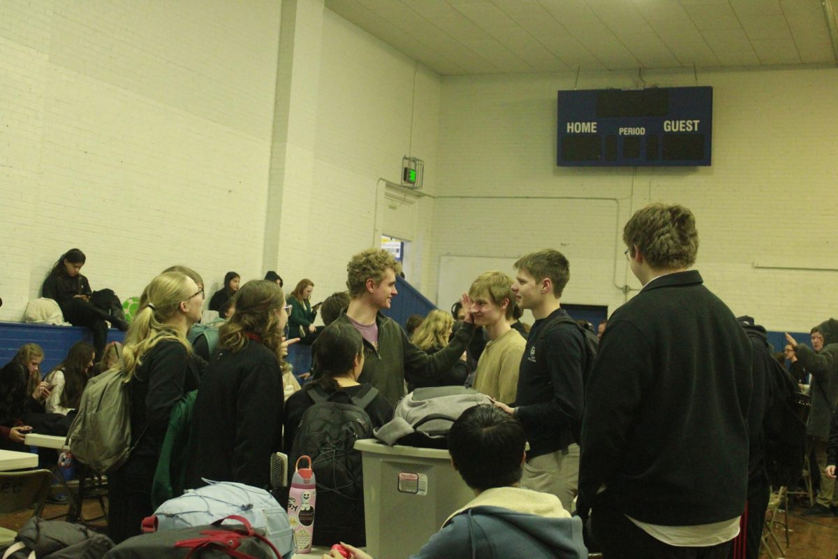 The speech hand drama students conversing about their rounds.(january 31st) 