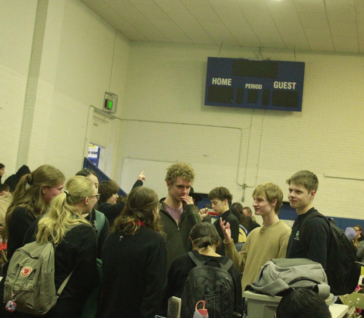 The speech hand drama students conversing about their rounds.(January 31st)