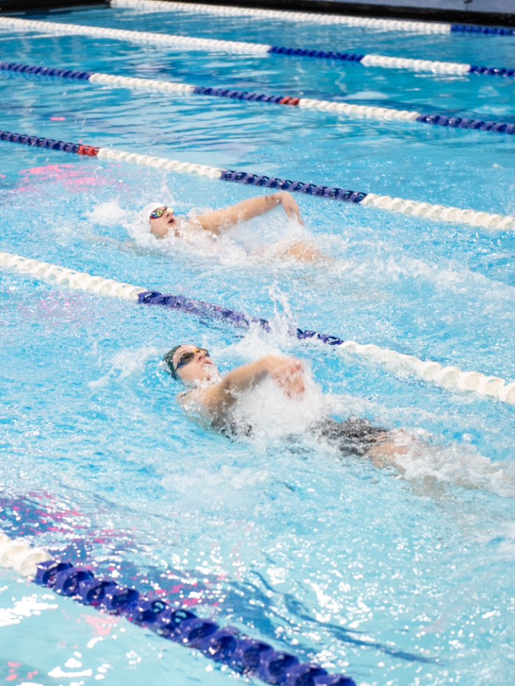 2.14.26
Senior Teaghan Vaira reaches out of the water while swimming in the Girls 100 Backstroke. 