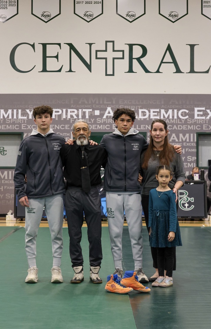 1.20.26
Billings Central senior Aramis Rivera takes a picture with his family on wrestling senior night. 