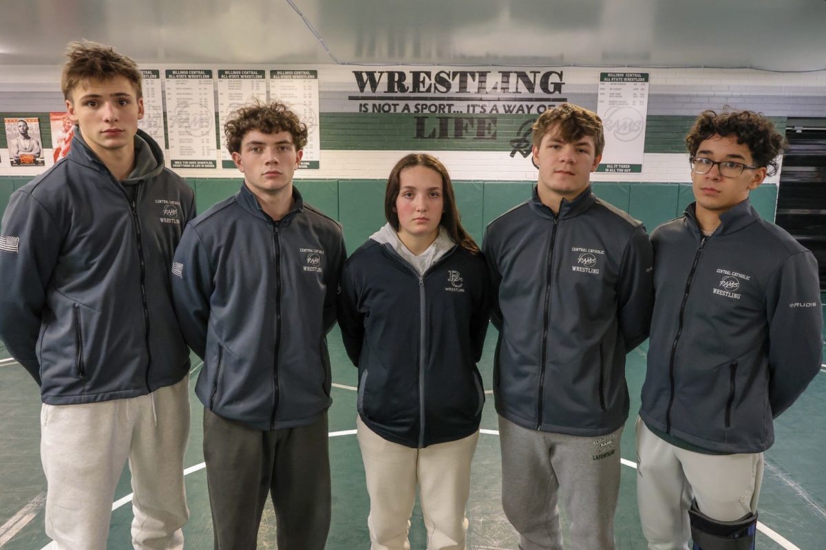 1.20.26
Wrestling seniors (From L to R) Trystan Knight, Jordan Harrell, Kaylee Giovetti, Jett Lafontaine, and Aramis Rivera stand in the wrestling room before competing on senior night. 