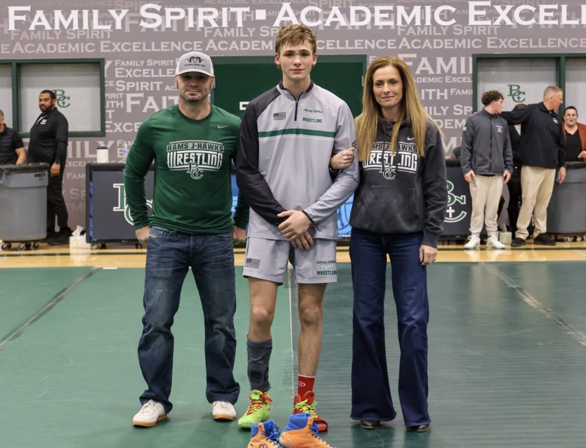 1.20.26
Joliet J-Hawks senior Trystan Knight with his parents at the senior night meet. 