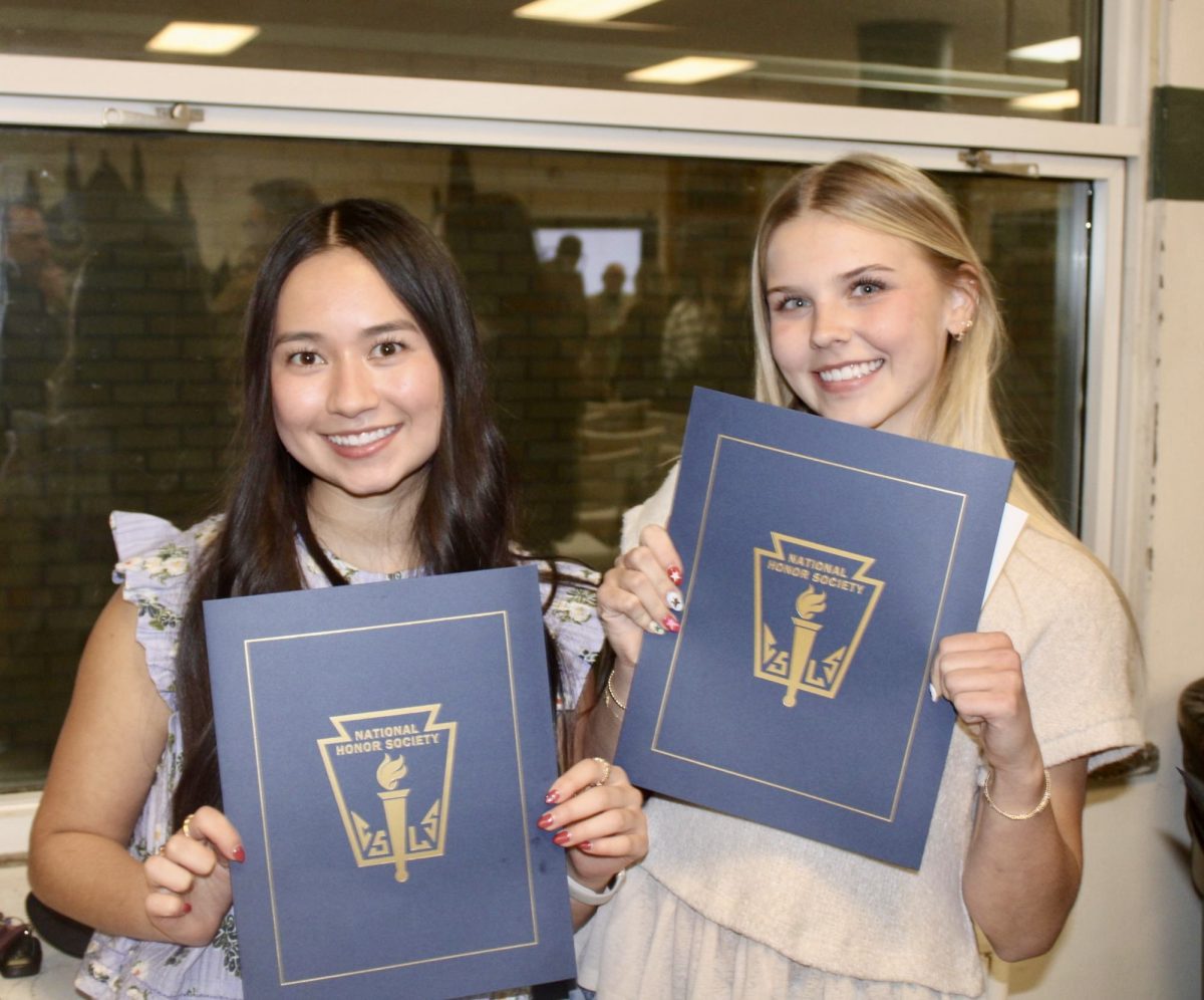 3.3.26
(From L to R) 
New junior NHS inductees Lizzie Rah and Avery Sorensen, posing for a photo with their certificates. 