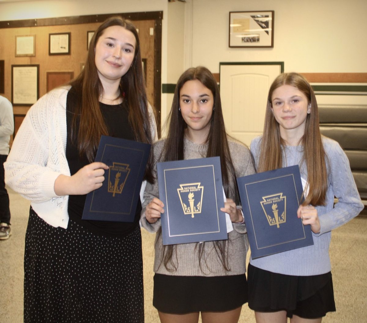 3.3.26
(From L to R) 
Juniors Samantha Ritchie, Rebecca Trickey, and Paula Twitchel posing after the NHS Induction Ceremony with their certificates. 
