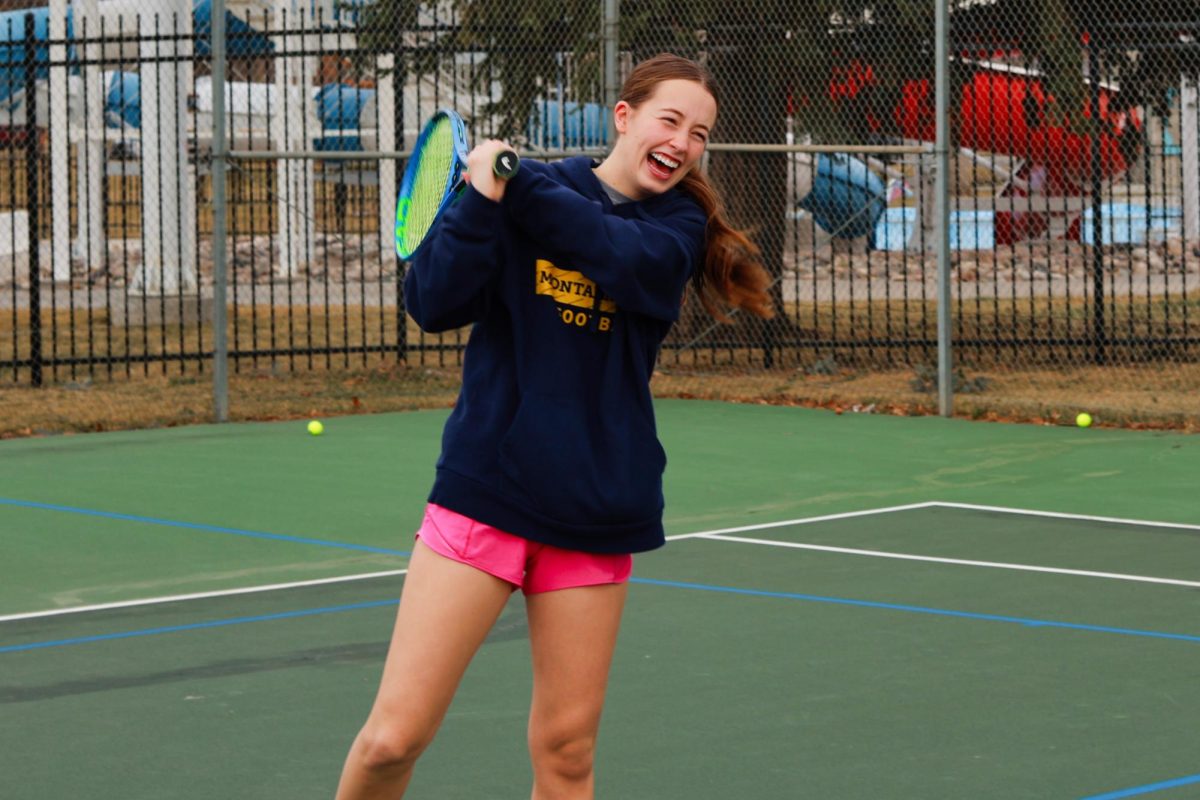 3.19.26
Senior Teaghan Vaira having fun while hitting a shot during tennis practice.