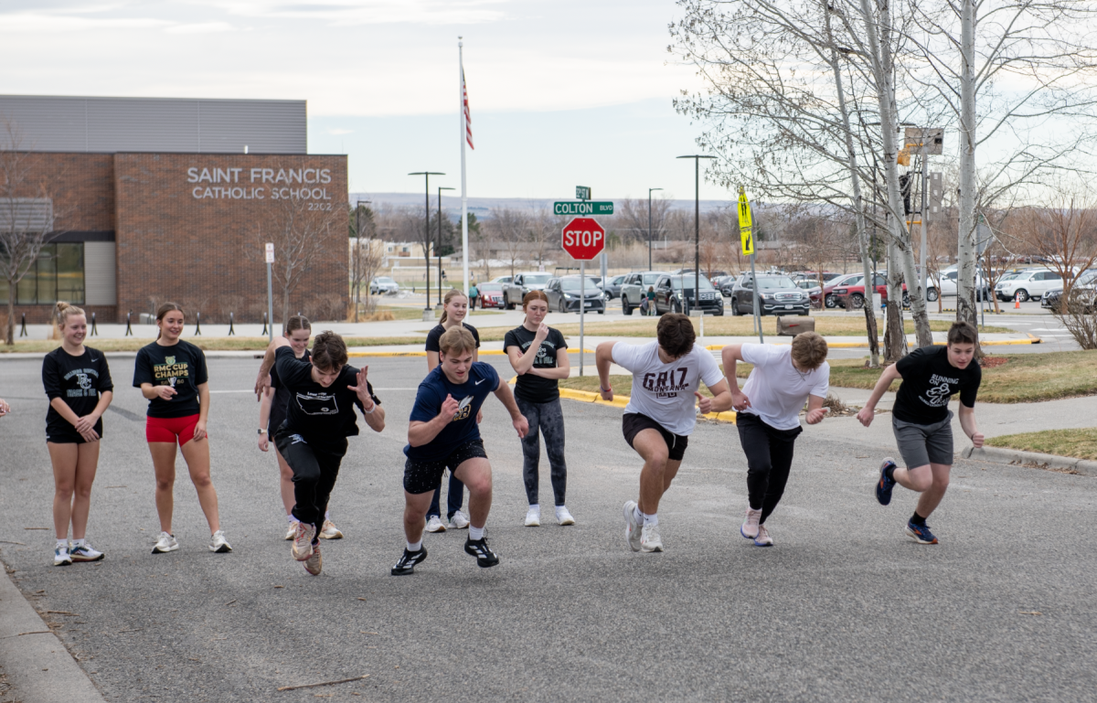 3.18.26
Junior track athletes speed up the hill as they explode from the start. 
