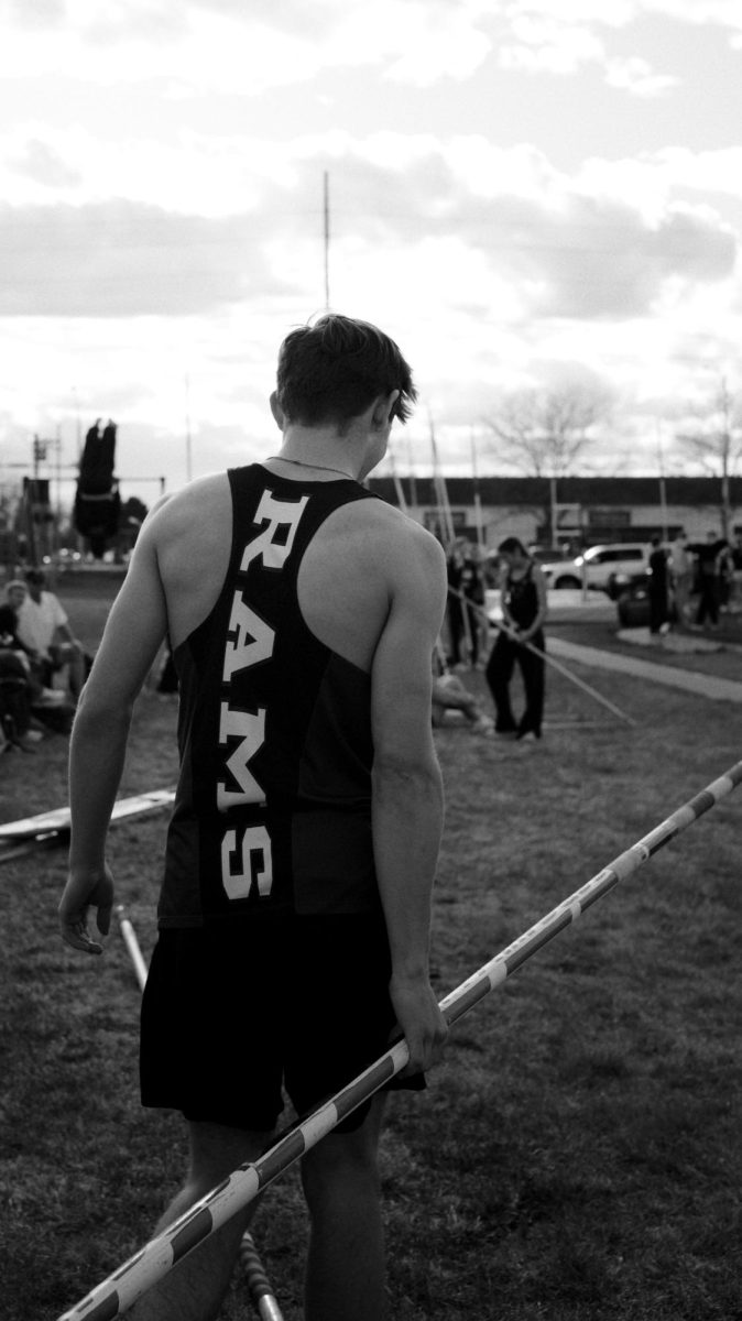 4.14.26. Junior Grady Dunn preparing himself for his school record jump of 13' 6".