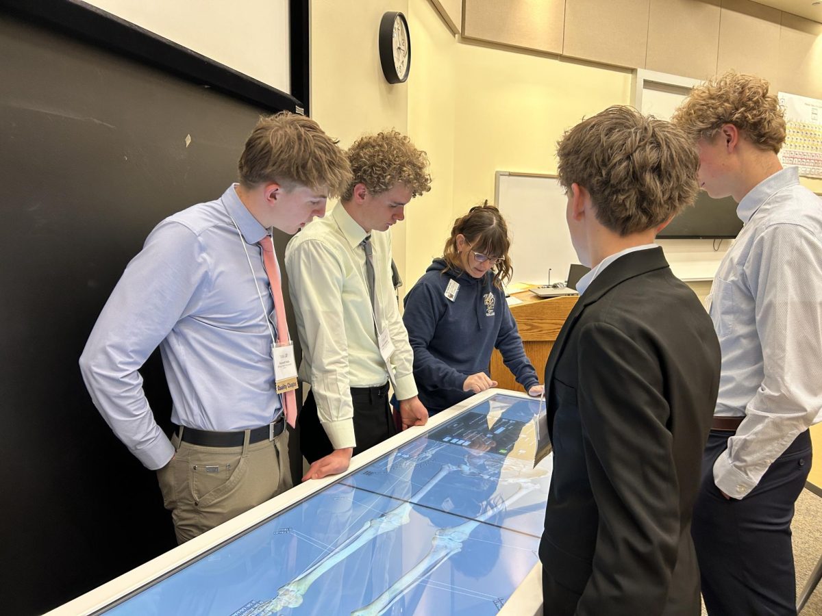3.31.26 
HOSA members on the first day of SLC doing a virtual dissection on the anatomage table. 