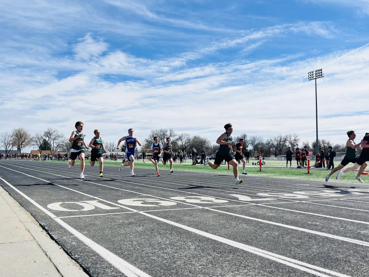 4/9/26
L to R
Freshman ? ?, Sophomore Bauer Beckwith, Senior ? ?, and senior ? ? sprinting 
