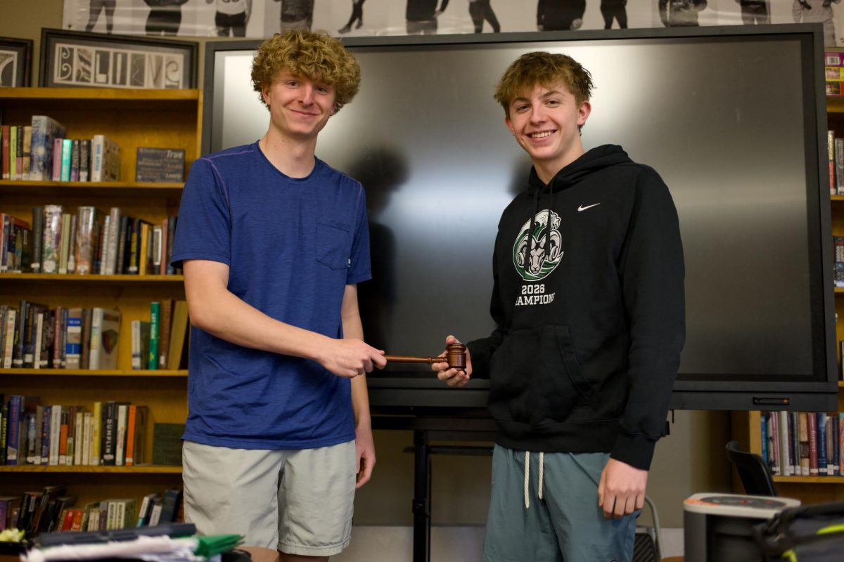 4.29.26 Former president Bowman Seitz (on the left) handing off the gavel and responsibiliities of presidency to upcoming president Bennet Seitz (on the right).