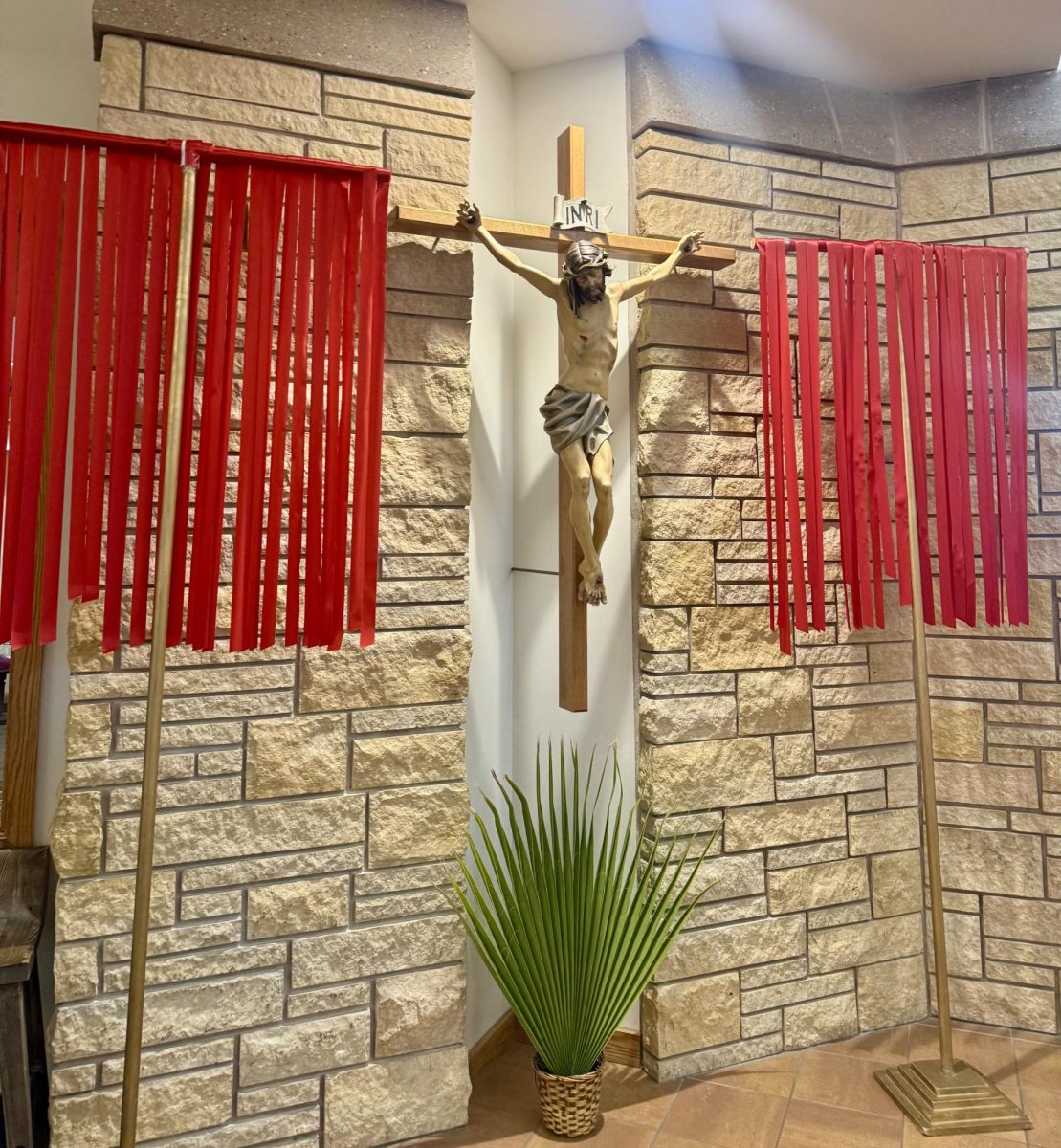 3.29.26
Banners and crucifix at St. Pius X Parish during Holy Week.