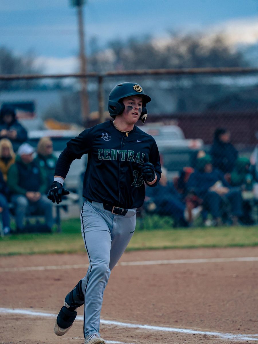 3.3.26
Sophmore Porter Dahlberg running to first base after a hit to right field against the Huntley Red Devils in Huntley