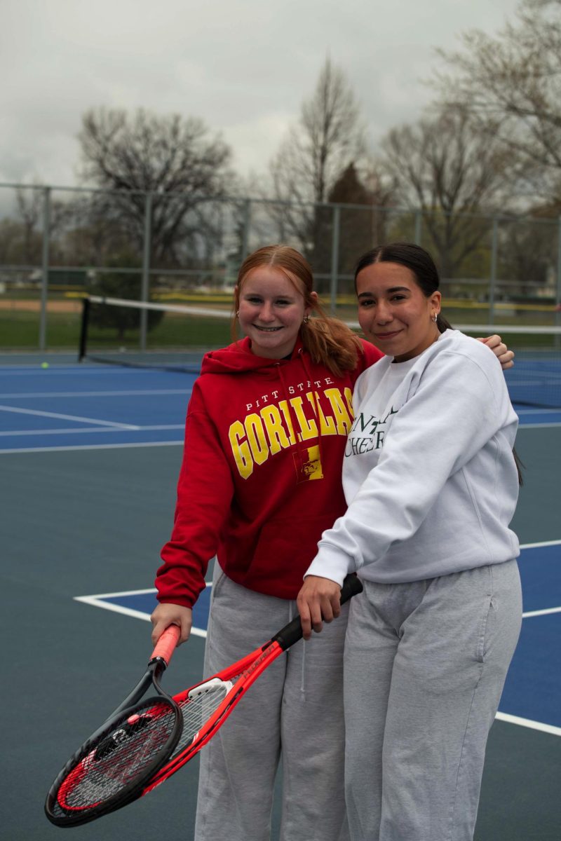 4.16.26
(L to R)
Freshman Victoria Willis and Junior Sina Neye posing for a photo at tennis practice.
