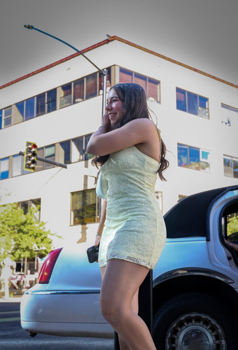 5.8.26
Junior Sina Neye walking out of a limousine, arriving at Alberta Bair theater for the Billings Central student movie premiere. 